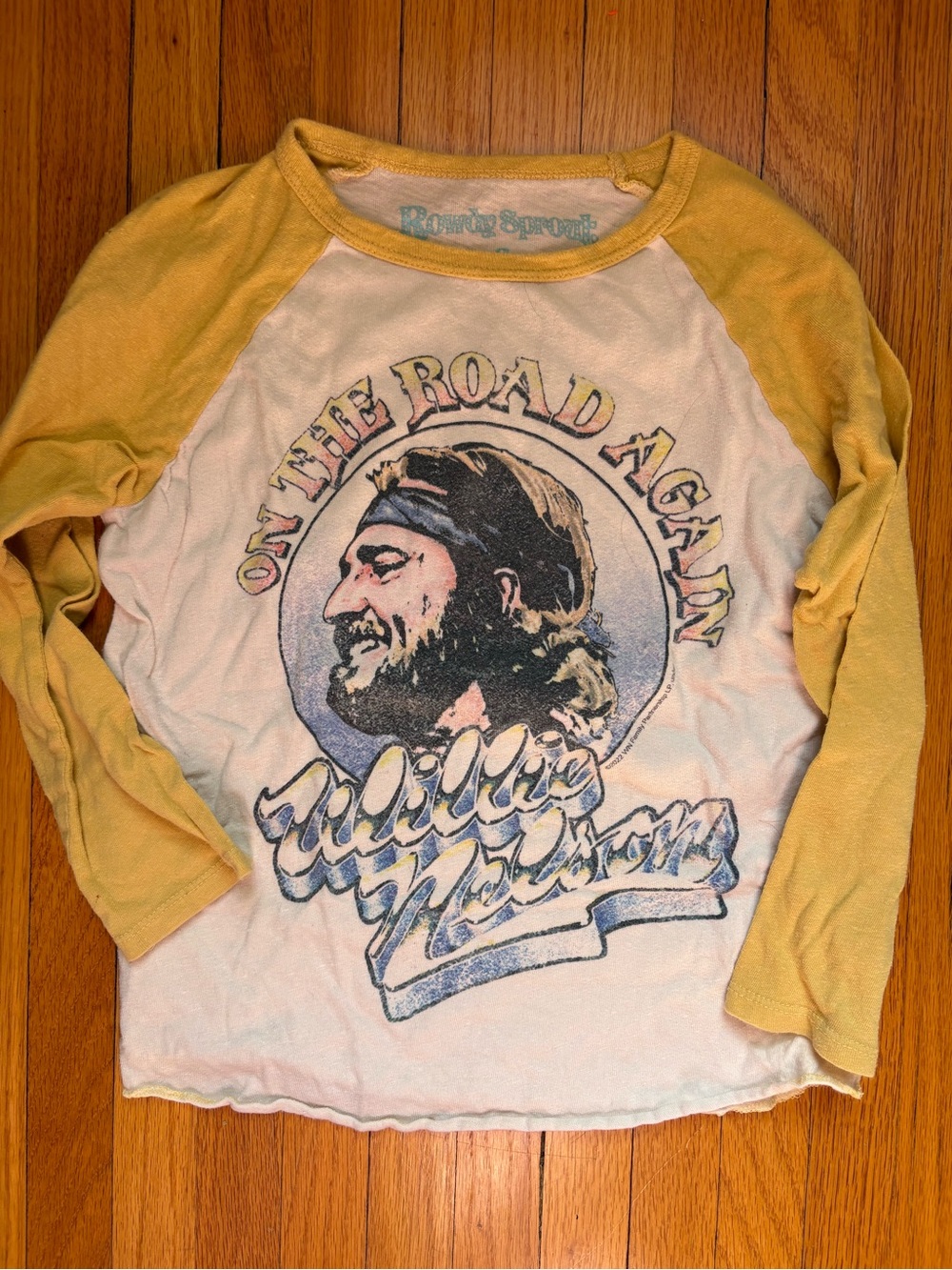 Rowdy Sprout Willie Nelson Yellow and Cream Raglan Long-Sleeve Graphic Tee